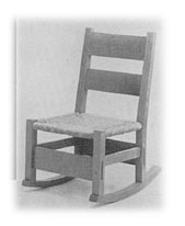 Sewing chair in dark fumed oak, with rush seat